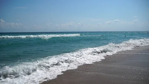Small waves of the sea coast Stock Footage 115358332