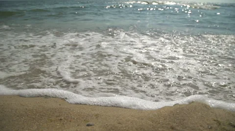 Small waves of the sea at dawn Stock Footage 67956477