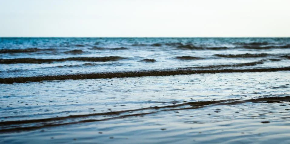 Small waves on the sea surfacev Stock Photos