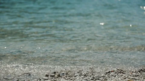 Small waves on seashore Stock Footage 106203466