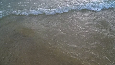 Small waves on the seashore. Slow motion Stock Footage 114064813