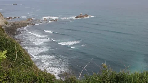 Small waves seen from a cliff Stock Footage 275562837