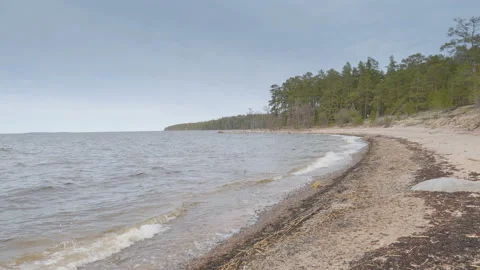 The small waves splashing on the shore Stock Footage 152657927