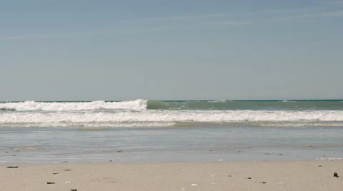 Small waves washing up at the beach Stock Footage 53793775