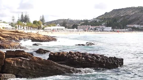 Small waves washing on Praia da Luz beach, Algarve Stock Footage 161121352