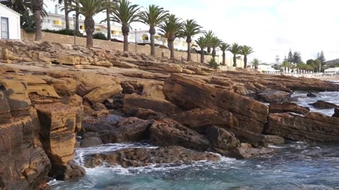 Small waves washing on Praia da Luz beach, Algarve Stock Footage 161121364