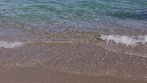 Small waves washing sandy beach, calm sea Stock Footage 327248320