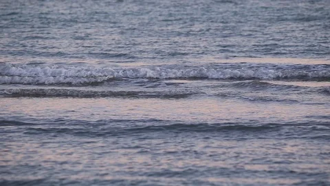 Small waves of water advancing on the sea and falling down Stock Footage 125140922