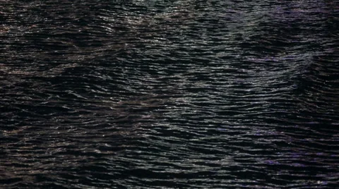Small waves on the water surface at night 스톡 동영상 42855096