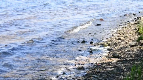 Small waves (wavelets) on the shore Stock Footage 49928304