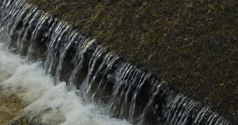 Small weir of river water Stock Footage 85107971