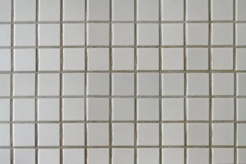 Small white ceramic tiles pattern as background Foto stock