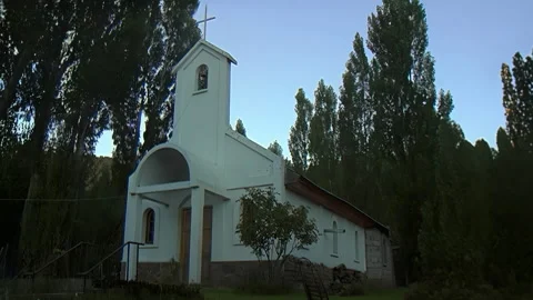Small White Chapel Surrounded By Tall Trees Video stock 336817228