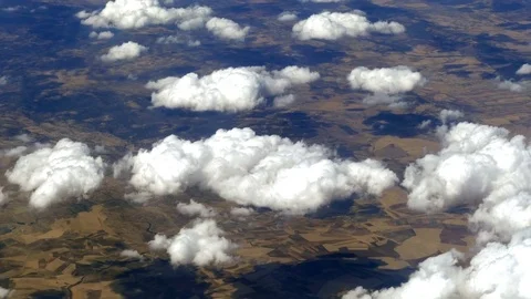 Small white clouds above the ground, top view. Stock Footage 72337539