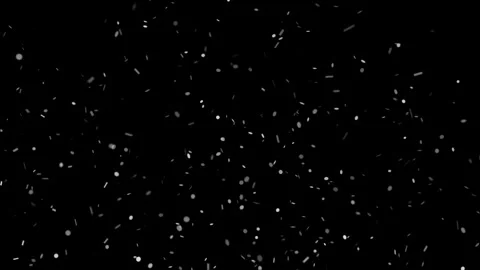Small white confetti pieces falling down on black background Stock Footage 327594756