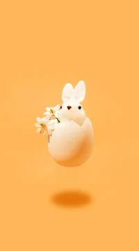 A small white fluffy Easter bunny is found in the shell of an Easter egg. Stock Photos