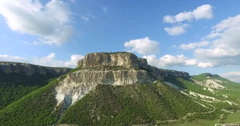 Small White Mountain With Trees Video stock 63334339