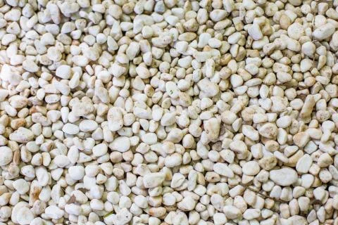 Small White Pebble Rocks Background Stock Photos