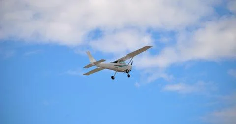 Small white plane taking off Stock Photos