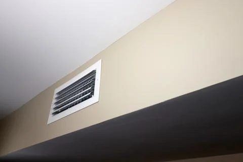 Small White Rectangle Air Vent in a Wall of a Home HVAC System Stock Photos