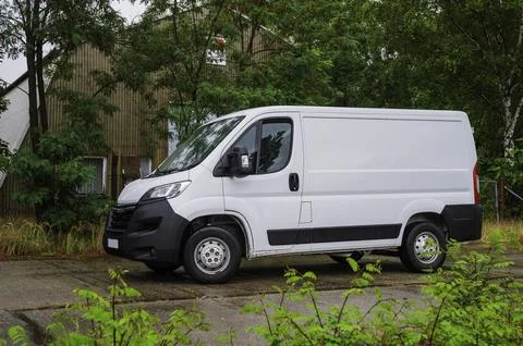 A small white van Stock Photos