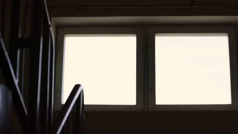 Small white windows with wooden frames in entrance Stock Footage 114797566