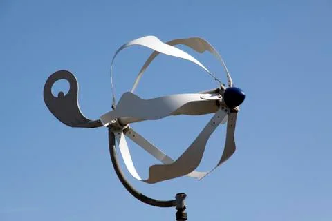 Small wind turbine making electicity out of wind Stock Photos