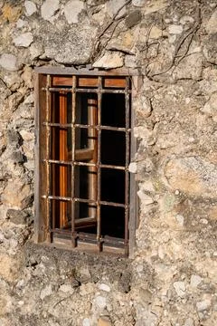 Small window with bars Stock Photos