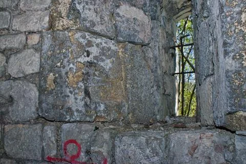 Small window in an old castle tower Stock Photos