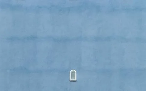 Small windows on large facade Stock Photos