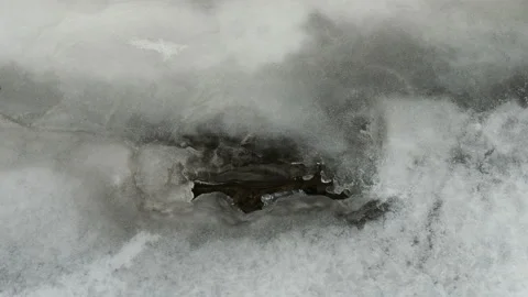 Small winter thawed patch on a snow pool and a blank space for the text Stock Footage 144105809