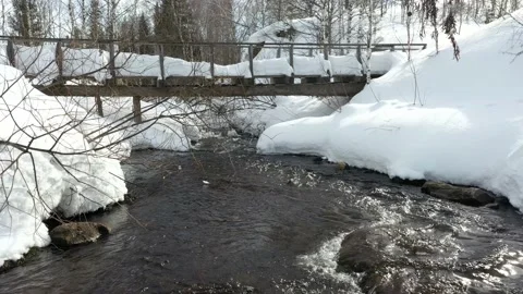 Small wooden bridge over stream. Видео 168890701