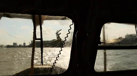 Small work boat is rolling on the waves, 4k shot. Stock Footage 64890353