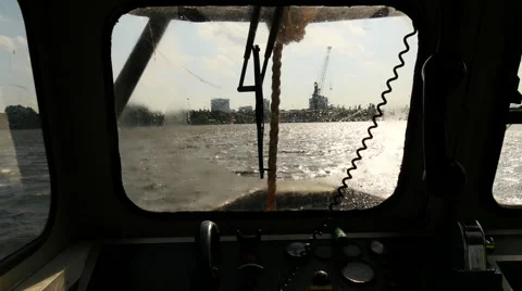 Small work boat is sailing in port 4k, shot Stock Footage 64890608