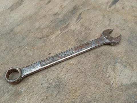 Small wrench on the floor Stock Photos