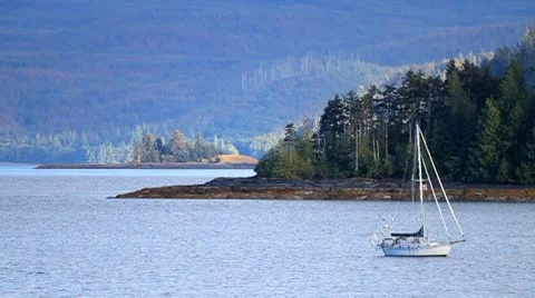 A small yacht on the ocean Stock Footage 10743511