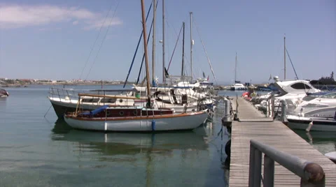Small yachts by jetty in Paphos Stock Footage 39715039