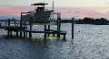 Small Yatch Lifted On Dock At Sunset HD Footage
