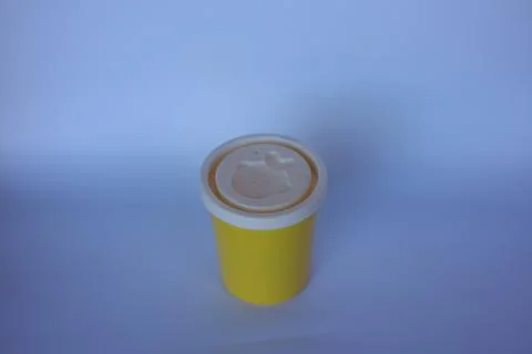 Small yellow bottle. Stock Photos
