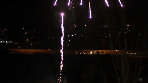 Smaller Firework Shooting into Sky and Exploding TILT UP 動画素材 107277568