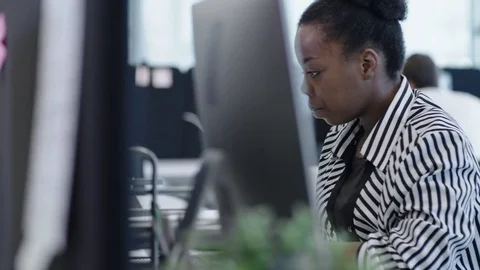 Smart African Businesswoman Typing on Computer Stock Footage