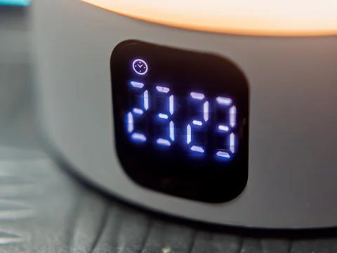 Smart Alarm Clock Displaying Time in Digital Format Stock Photos