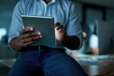 Smart apps keep things streamlined and efficient. an unrecognisable businessman Stock Photos