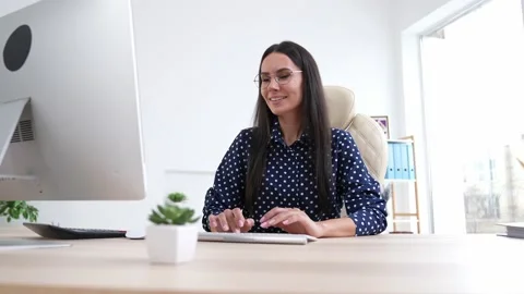 Smart boss lady use gadget interaction partners desk in modern workspace Stock Footage 189649935