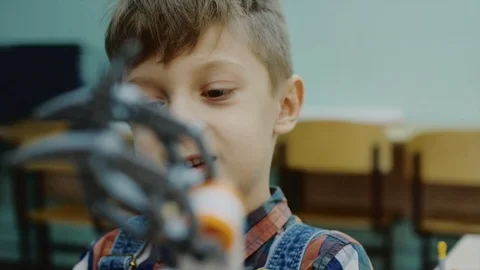 Smart boy programming robots. Stock-Footage 92948444