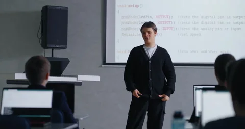 Smart Boy Student Speaking In Classroom And Talking With Classmates, Programming Stock Footage 281613864