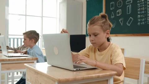 Smart boy using laptop to generated AI by coding engineering prompt. Pedagogy. Stock Footage 266941844