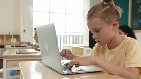 Smart boy using laptop to generated AI by coding engineering prompt. Pedagogy. Stock Footage 275558993