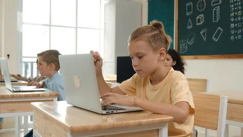 Smart boy using laptop to generated AI by coding engineering prompt. Pedagogy. 스톡 사진