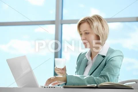 Smart business woman working during break Stock Photos